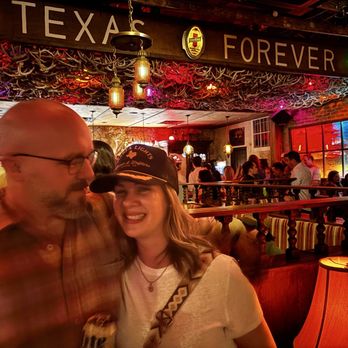Marfa Lights Bar - Lounge area in front of bar "Texas Forever" - Whiskey Bars Near Me - Austin, Texas Marfa Lights Bar - Lounge area in front of bar "Texas Forever" - Whiskey Bars Near Me - Austin, Texas