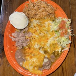 Casa De Suenos - Chicken enchilada platter with green sauce. On point!
