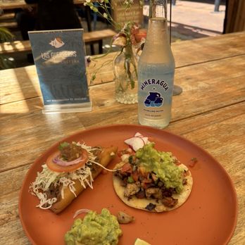 Las Guerreras - Pollo asado taco, shrimp empanada, guacamole and a bottle of sparkling water. - Breakfast & Brunch Near Me - Oakland, California Las Guerreras - Pollo asado taco, shrimp empanada, guacamole and a bottle of sparkling water. - Breakfast & Brunch Near Me - Oakland, California