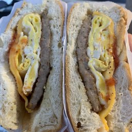 Sausage egg and cheese... salt pepper ketchup. Solid sandwich... one of the best in the area