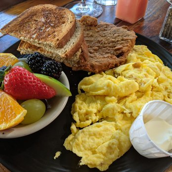 The Hideout Kitchen - Country Fried Steak & Eggs with gravy on the side, scrambled eggs, white toast, side of fruit - New American Near Me - Lafayette, California