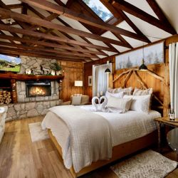 Arrowhead Pine Rose Cabins - #11 Rustic Romace, A pond side studio cabin with fireplace & hot tub
