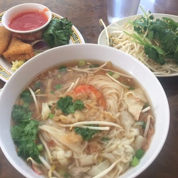 Lien Hung Restaurant - Rice noodle pho with shrimp, pork and squid ( accompanied with bean sprouts and cilantro - right ) and an order of shrimp toast ( left) - Chinese Near Me - San Antonio, Texas