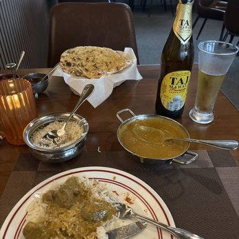 Indian Express Food - Lamb Korma, garlic naan, and Taj Mahal Beer - Indian Near Me - Longwood, Florida Indian Express Food - Lamb Korma, garlic naan, and Taj Mahal Beer - Indian Near Me - Longwood, Florida