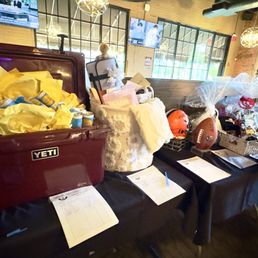 Silent auction items beautifully displayed and organized by their event coordinator!