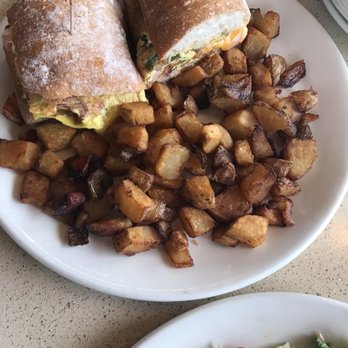 Massapequa Diner - Forgot name but it's an omelette sandwich with home fries on the side - Diners Near Me - Massapequa, New York