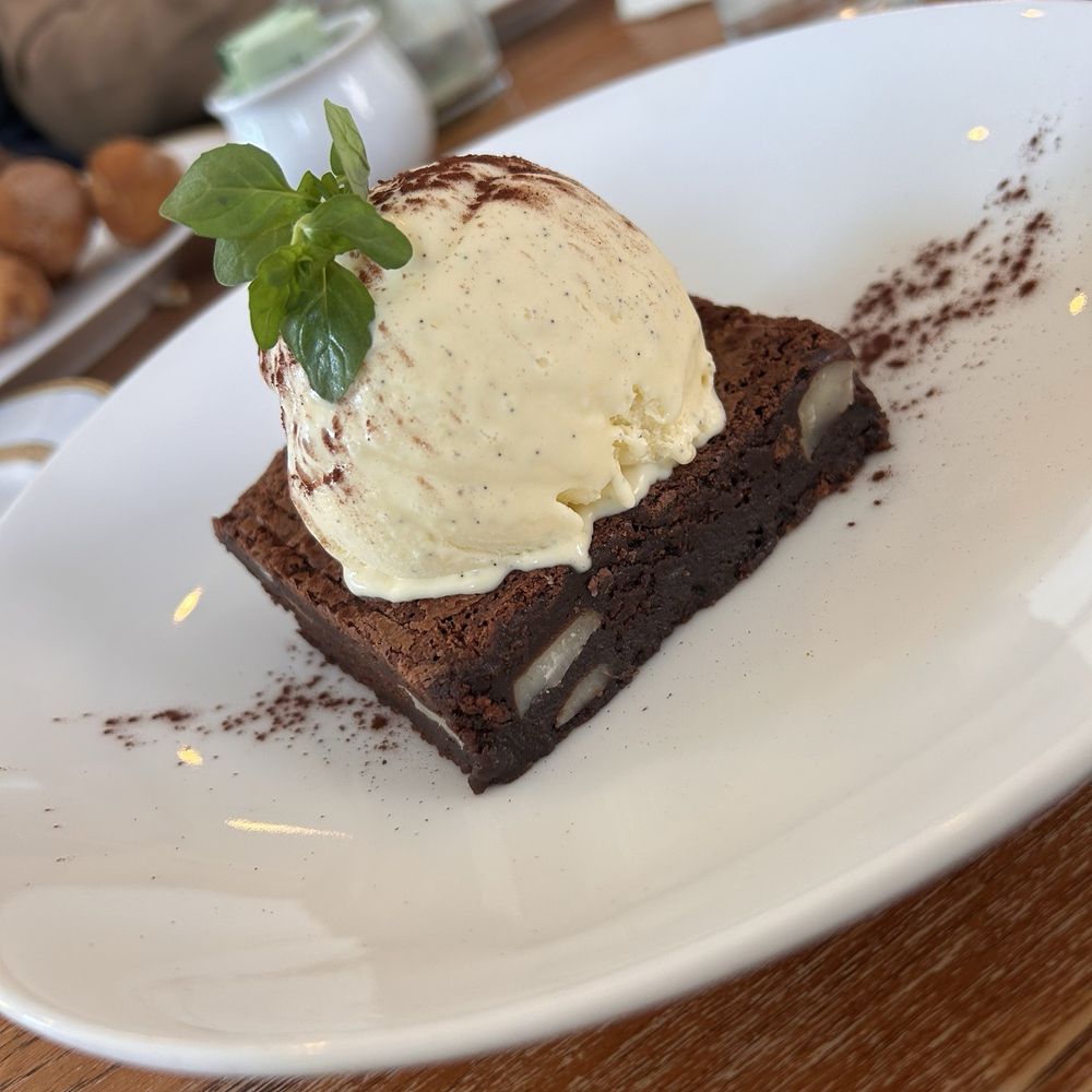 Brownie and homemade vanilla bean ice cream Brownie and homemade vanilla bean ice cream
