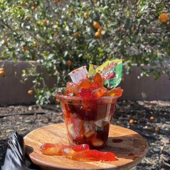 Sal Y Limon - Our candy cups - Packed with sour gummies & lollipops, then drenched in chamoy and candy powder! Sweet, sour, spicy... the ultimate treat! - Caterers Near Me