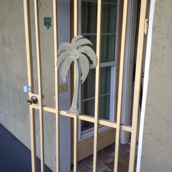 The Victorian Condominiums - Metal gate leading to room. - Condominiums Near Me - Galveston, Texas