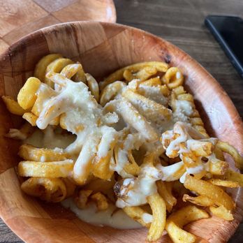 Cavo's Bar & Kitchen - Side of cheese fries. - Sports Bars Near Me - Orlando, Florida Cavo's Bar & Kitchen - Side of cheese fries. - Sports Bars Near Me - Orlando, Florida