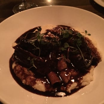 V's restaurant + bar - Braised Lamb osso bucco on cream polenta - Mediterranean Near Me - Malibu, California V's restaurant + bar - Braised Lamb osso bucco on cream polenta - Mediterranean Near Me - Malibu, California