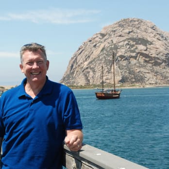 Knowles Chiropractic Office - Dr. Knowles enjoys traveling with family. Here he is with a pirate ship. - Chiropractors Near Me - Medford, Oregon Knowles Chiropractic Office - Dr. Knowles enjoys traveling with family. Here he is with a pirate ship. - Chiropractors Near Me - Medford, Oregon