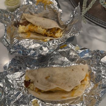 Daddy's Tacos - Bacon egg and cheese taco and the second is brisket egg and cheese - Mexican Near Me - Mckinney, Texas Daddy's Tacos - Bacon egg and cheese taco and the second is brisket egg and cheese - Mexican Near Me - Mckinney, Texas