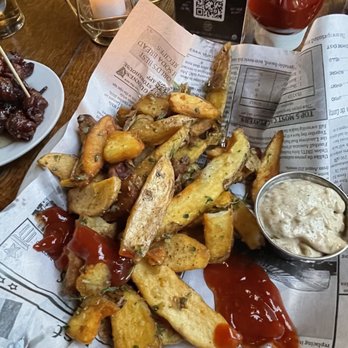 O'Sullivans Pub - French fries w/mustard sauce similar to one served with Scottish Egg but w/slight twist. - Irish Pub Near Me - Decatur, Georgia