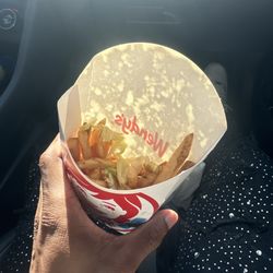 Wendy's - Horribly packed fries w lettuce They were upset that i came in and asked for a remake.