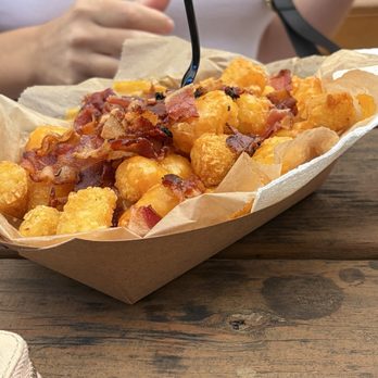 Mess Hall - Tater tots loaded with cheese and bacon - Burgers Near Me - Wilmington, North Carolina Mess Hall - Tater tots loaded with cheese and bacon - Burgers Near Me - Wilmington, North Carolina
