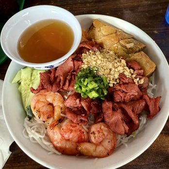 999 Phở - My favorite. Flamed broiled pork and shrimp with an egg roll served over vegetables and vermicelli noodles. - Vietnamese Near Me - Reno, Nevada 999 Phở - My favorite. Flamed broiled pork and shrimp with an egg roll served over vegetables and vermicelli noodles. - Vietnamese Near Me - Reno, Nevada