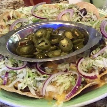 Fresco's Cocina Mexicana - Fajita steak nachos with shredded lettuce and red onion added an extra jalapeños - Mexican Near Me - Watauga, Texas