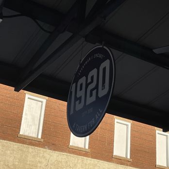 1920 Tavern - The 1920 sign on the patio. - Bars Near Me - Roswell, Georgia