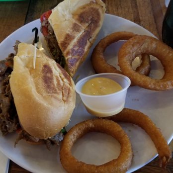 The Landing Beach Bar - Awesome Philly Cheesesteak with Onion Rings - New American Near Me - Christiansted, Virgin Islands The Landing Beach Bar - Awesome Philly Cheesesteak with Onion Rings - New American Near Me - Christiansted, Virgin Islands