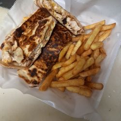 Olympia Cafe - Quesadillas. Order chicken or beef. 
Loaded with green pepper mushroom onion chadder cheese mozzarella cheese.   yes it comes with fries