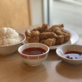 Happy Dragon - a plate of fried chicken, rice, and dipping sauce - Chinese Near Me - New Braunfels, Texas Happy Dragon - a plate of fried chicken, rice, and dipping sauce - Chinese Near Me - New Braunfels, Texas