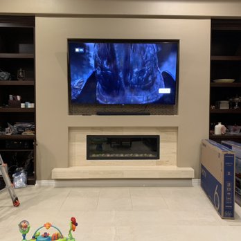 Pro TV Mounters - Fireplace install in tile with power - TV Mounting Near Me - Scottsdale, Arizona Pro TV Mounters - Fireplace install in tile with power - TV Mounting Near Me - Scottsdale, Arizona