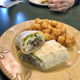 Steak and cheese in front, breakfast burrito with ham in the back. Steak and cheese in front, breakfast burrito with ham in the back.