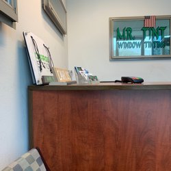 Photo of Mr Tint Window Tinting - Norco, CA, US. Front desk with devices charge station