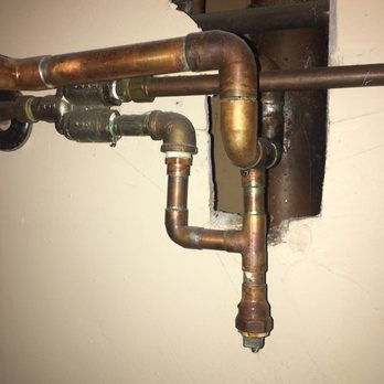 All-Star Plumbing & Heating - Before photo: horrible water leaks in several connections and boiler shifted 4-5" away from the wall from earthquake damage. - Plumbing Near Me All-Star Plumbing & Heating - Before photo: horrible water leaks in several connections and boiler shifted 4-5" away from the wall from earthquake damage. - Plumbing Near Me