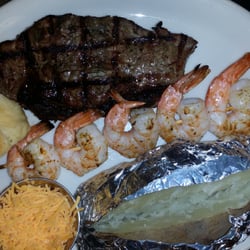 Beach House - Surf and Turf with baked potato and a homemade roll