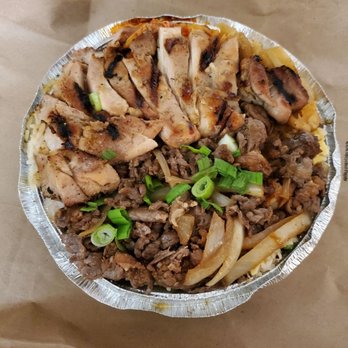 Chimac - Half/half bowl (chicken/steak) with shrimp fried rice under the meat, very flavorful & delicious. - Chicken Wings Near Me - Houston, Texas Chimac - Half/half bowl (chicken/steak) with shrimp fried rice under the meat, very flavorful & delicious. - Chicken Wings Near Me - Houston, Texas