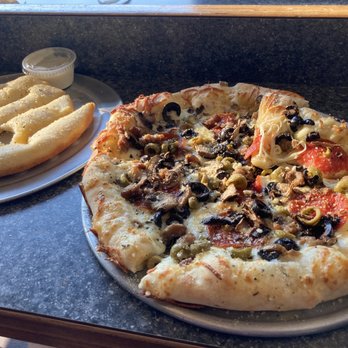 Pie Five Pizza - Here's an example of their pizza and garlic bread. - Pizza Near Me - Allen, Texas