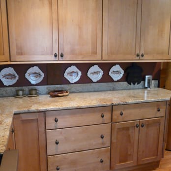 Design Essence - Kitchen design focusing on a collection of fish accessories. - Interior Design Near Me - Old Saybrook, Connecticut Design Essence - Kitchen design focusing on a collection of fish accessories. - Interior Design Near Me - Old Saybrook, Connecticut