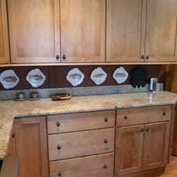 Kitchen design focusing on a collection of fish accessories.