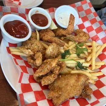 Rockfish Harbor Grill - Fisherman's Platter(Calamari, Fried Shrimp, Fried Fish, and French fries) - Seafood Near Me - Monterey, California Rockfish Harbor Grill - Fisherman's Platter(Calamari, Fried Shrimp, Fried Fish, and French fries) - Seafood Near Me - Monterey, California