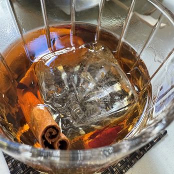 The Lounge - They're take on a fall old fashioned with bourbon, bitters, cinammon stick, dehydrated apple. - Lounges Near Me - San Francisco, California The Lounge - They're take on a fall old fashioned with bourbon, bitters, cinammon stick, dehydrated apple. - Lounges Near Me - San Francisco, California