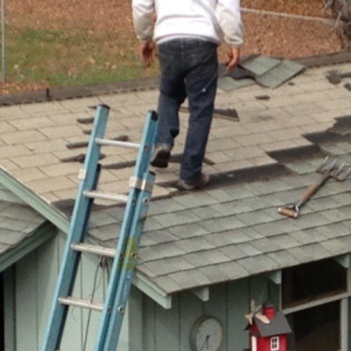 Slide of Steele's Roofing Company