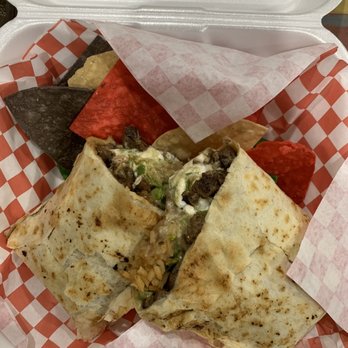 Taco Chundito - Carne asada burrito containing meat, rice, beans, cheese, and guac. Comes with chips. - Food Trucks Near Me - Hialeah, Florida