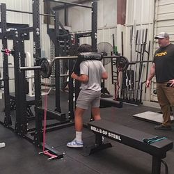 Lyft Station - Erik training with Mike (Black Dog Strength). Working on explosive energy with resistance bands.