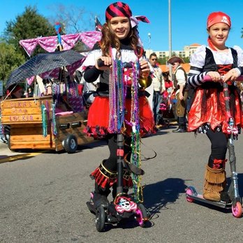 Gasparilla Children's Parade - Pirate babes on their scooters along the Gasparilla Children's Parade route - Festivals Near Me