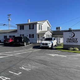 Exterior outside entrance of The Daily Grind - Rear parking lot from alley - Quarryville, Pennsylvania Exterior outside entrance of The Daily Grind - Rear parking lot from alley - Quarryville, Pennsylvania