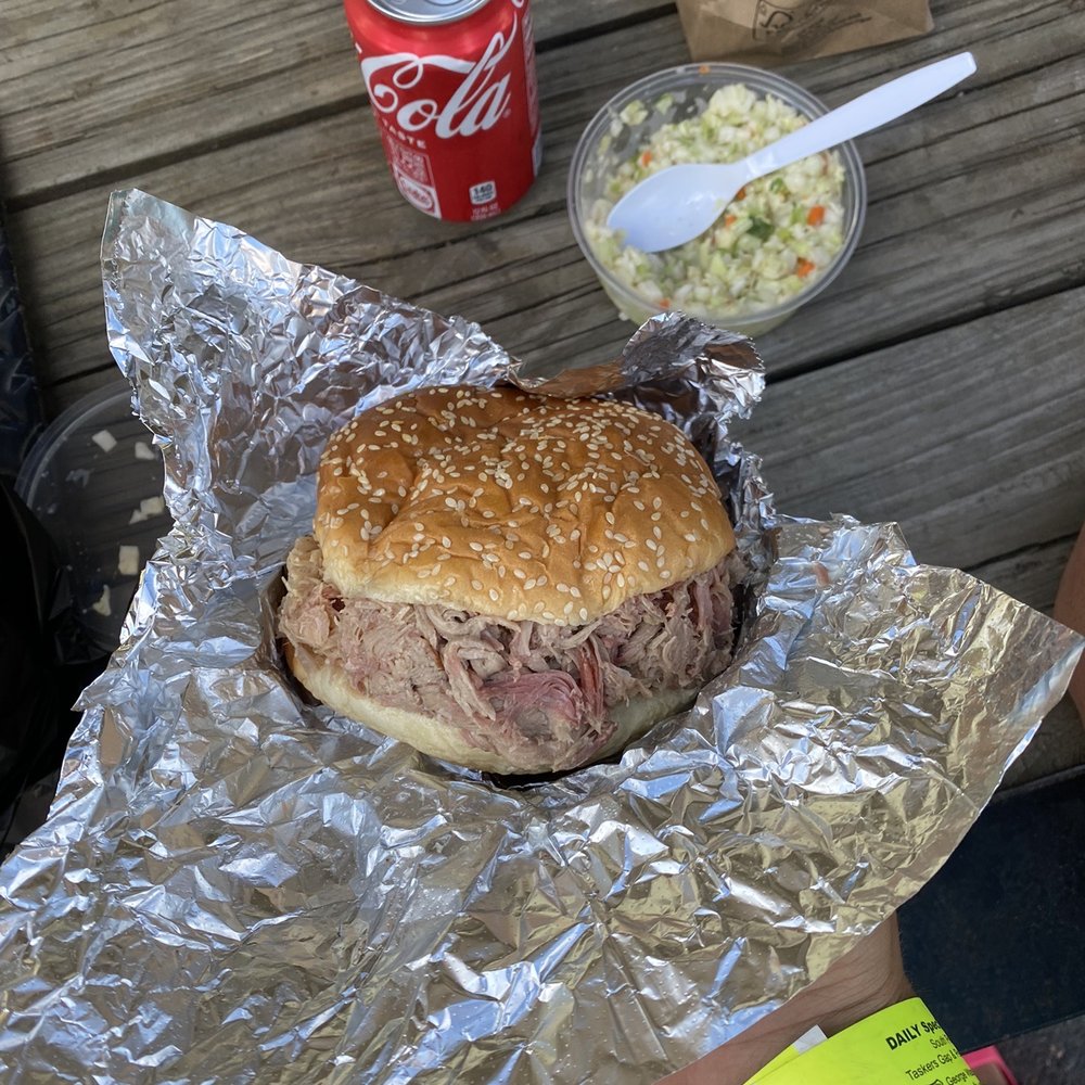Pulled pork sandwich with a side and coke, I think I love the coleslaw as much as the bbq! Pulled pork sandwich with a side and coke, I think I love the coleslaw as much as the bbq!