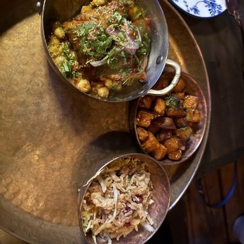 Ma’am Saab - Tasting menu appetizers - cabbage salad, samosas with chick peas and sweet & spicy sweet potatoes. - Pakistani Near Me - Charleston, South Carolina Ma’am Saab - Tasting menu appetizers - cabbage salad, samosas with chick peas and sweet & spicy sweet potatoes. - Pakistani Near Me - Charleston, South Carolina