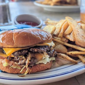 Hank’s Garage & Grill - Hanks Original Burger with Grilled Onions and Fries - Hot Dogs Near Me - Shawnee, Kansas