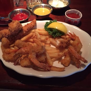 Pappadeaux Seafood Kitchen - Fried Shrimp & Cajun Chicken Tenderloins. Medium size with a few bites taken. NOT worth the price. - Seafood Near Me - Beaumont, Texas Pappadeaux Seafood Kitchen - Fried Shrimp & Cajun Chicken Tenderloins. Medium size with a few bites taken. NOT worth the price. - Seafood Near Me - Beaumont, Texas
