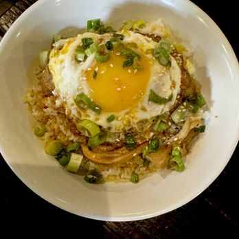 Adobo - Grandmas chicken adobo topped with fried egg. So good - New Mexican Cuisine Near Me - Denver, Colorado