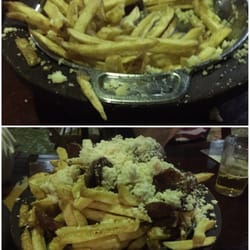 Sókana fries with cheese and sausage in a big bowl, not quite as deep as it looks but still a good serving