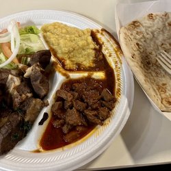 Hanat Restaurant/Somali Restaurant - Lamb and bread, $14 and worth every bite.