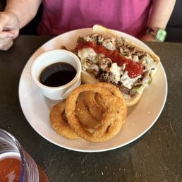 Philly Cheesesteak and onion rings